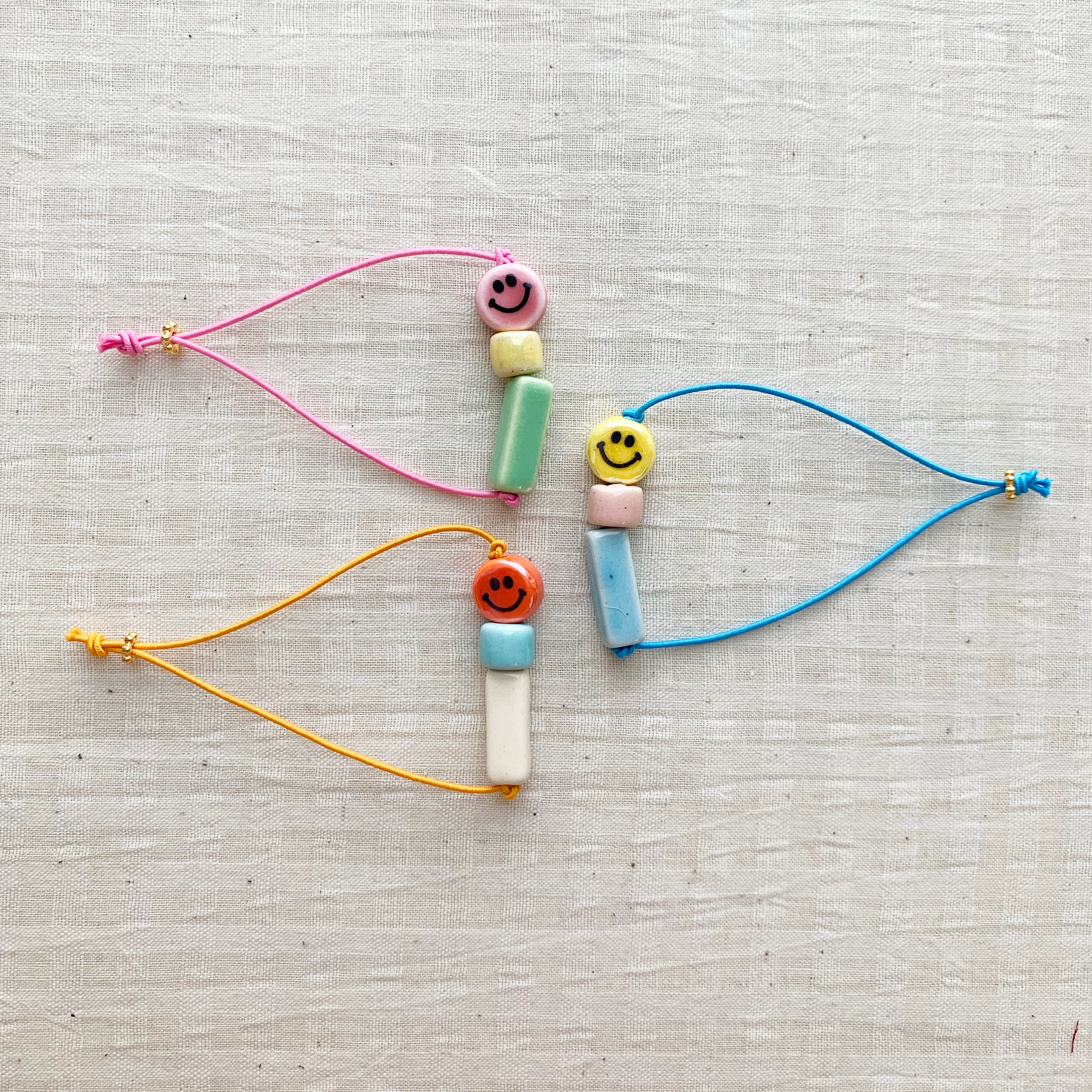 Happy Bracelet - Orange Smiley