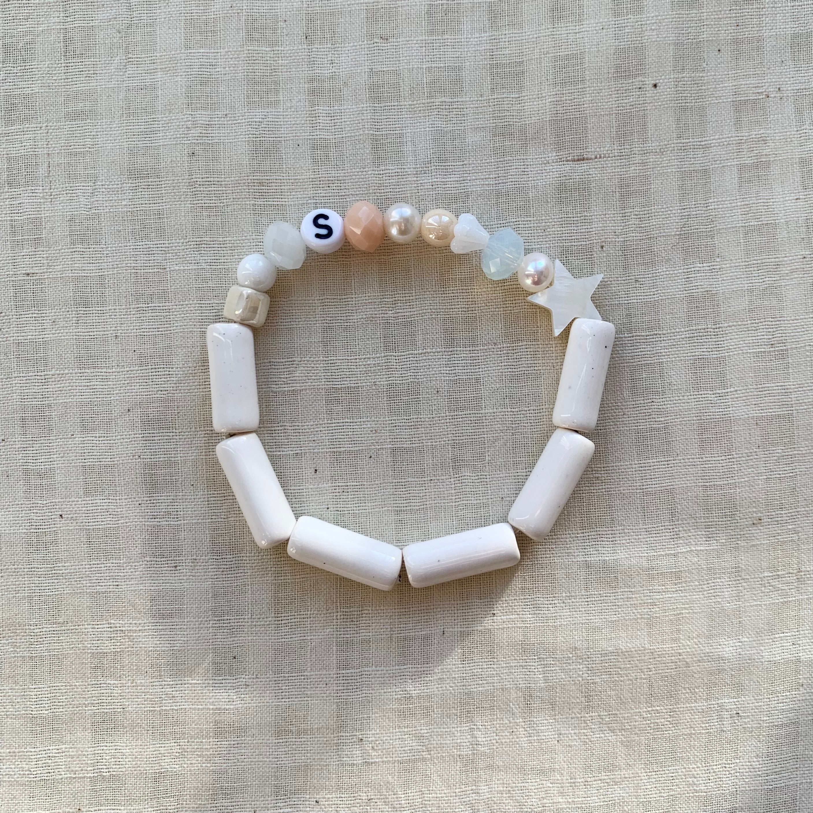 All White Pebbles with Initial Letter