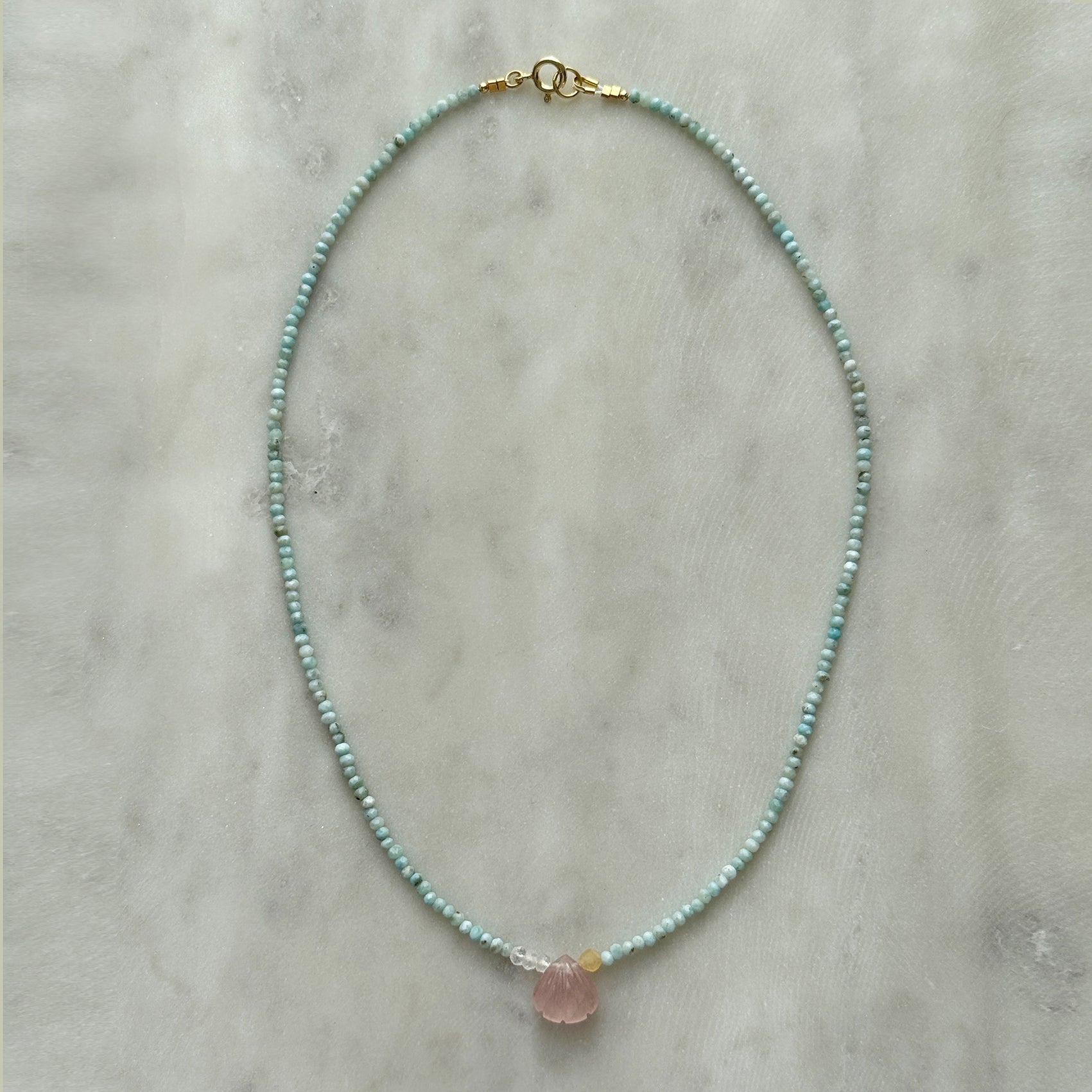 Tiny Rosequartz Shell