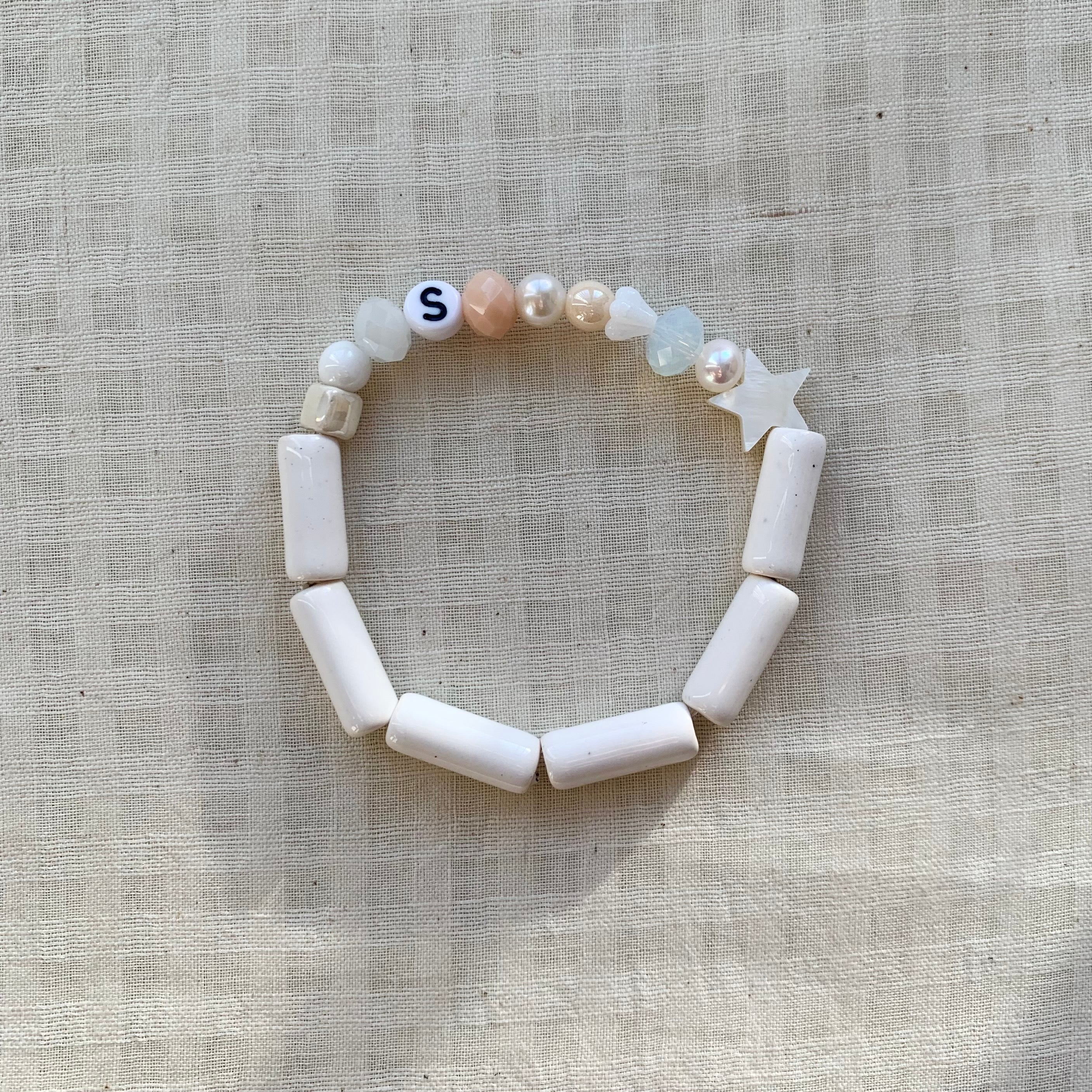 All White Pebbles with Initial Letter